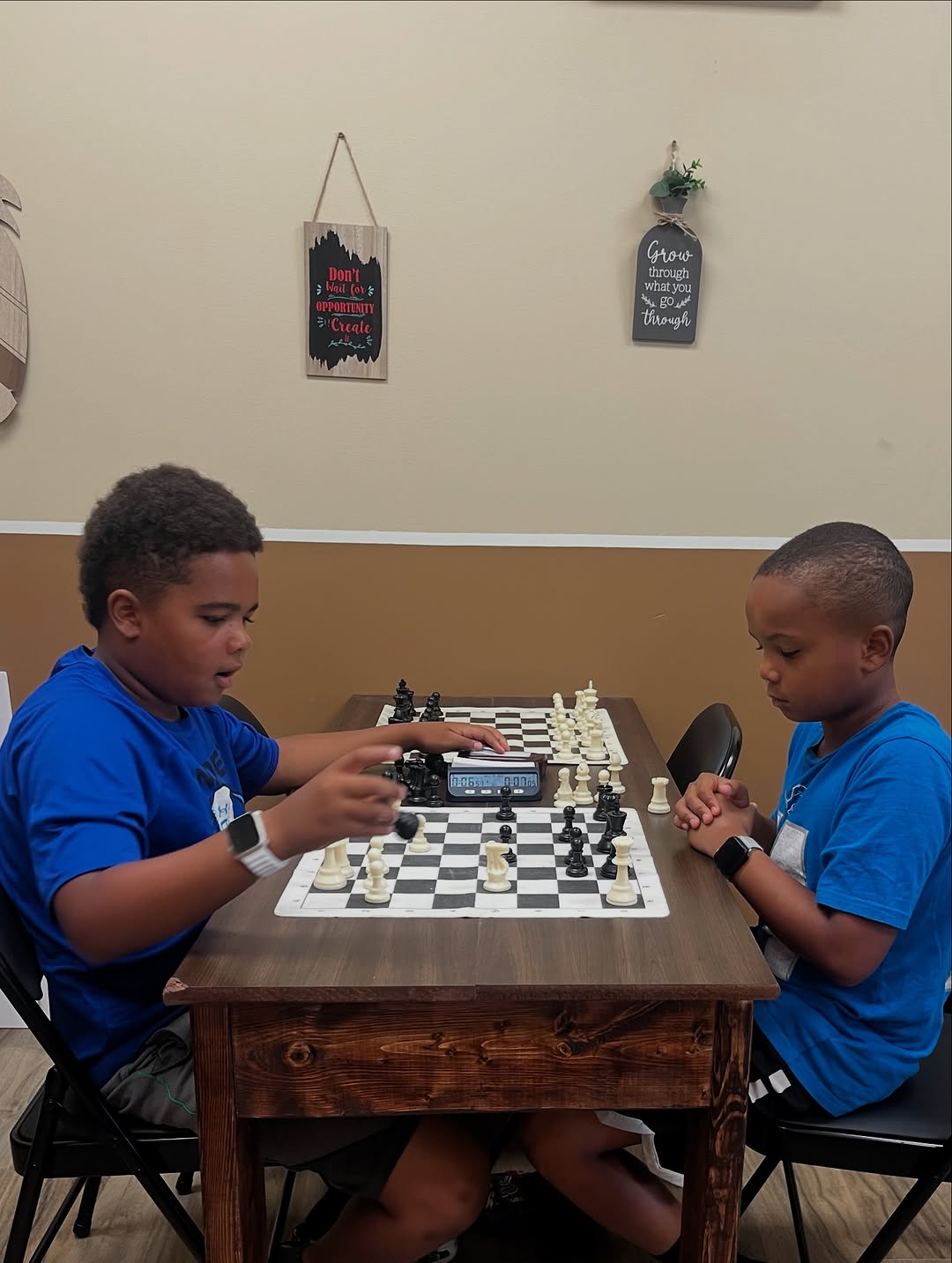 Students playing chess at an event