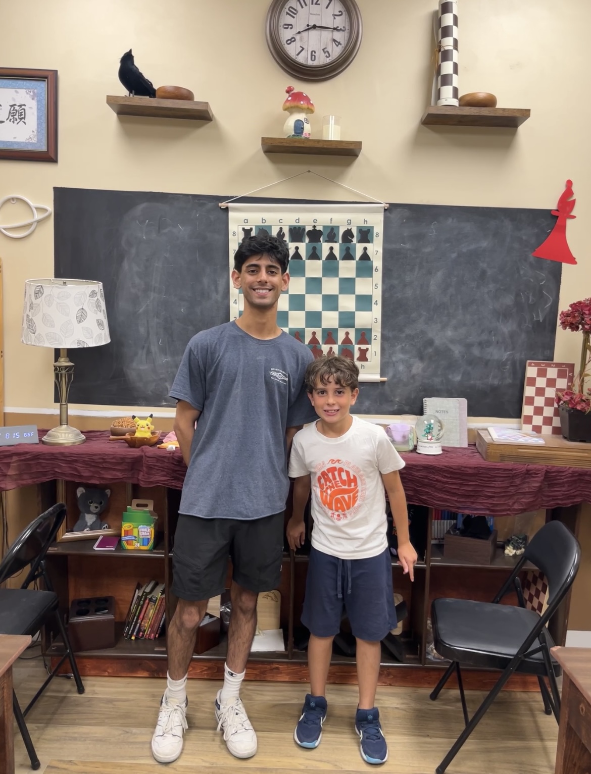 A student receiving a chess award